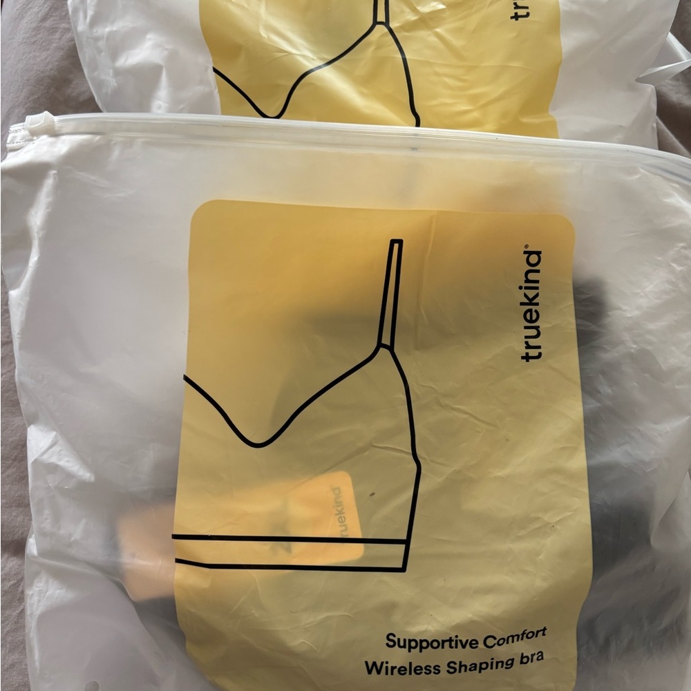 Truekind Wireless Shaping Bras. 2 white and 2 black